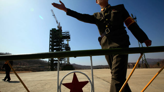 PHOTO: A North Korean soldier stands in front of the countrys Unha-3 rocket, slated for liftoff between April 12-16, at Sohae Satellite Station in Tongchang-ri, North Korea, April 8, 2012.