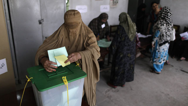 PHOTO: A Pakistani woman casts her ballot at a polling station on the outskirts of Islamabad, Pakistan, Saturday, May 11, 2013.