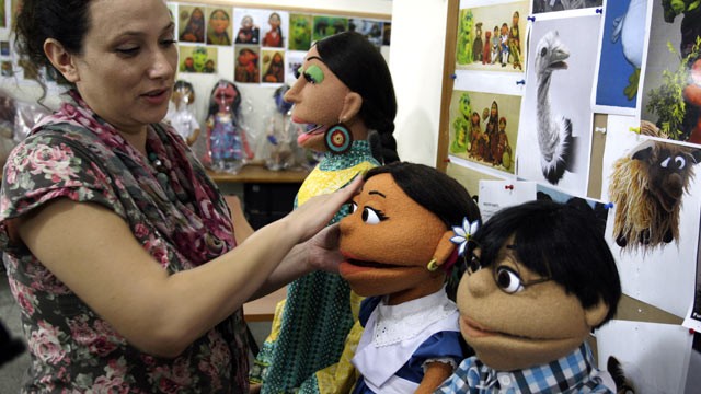 PHOTO: An artist gives final touches to characters of Pakistani Sesame Street in Lahore, Pakistan, Oct. 13, 2011.