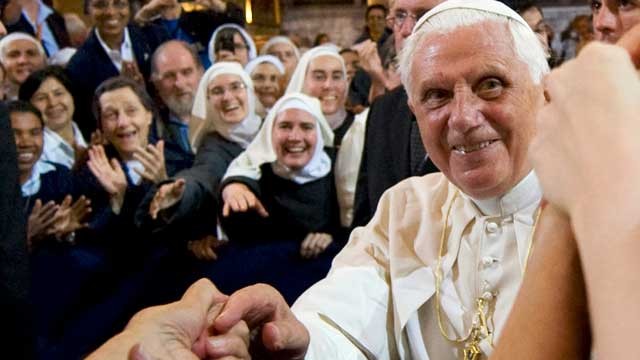 PHOTO: Pope Benedict XVI waves to wellwishers as he leaves the Notre-Dame cathedral in Paris, following a vespers service, Sept. 12, 2008.