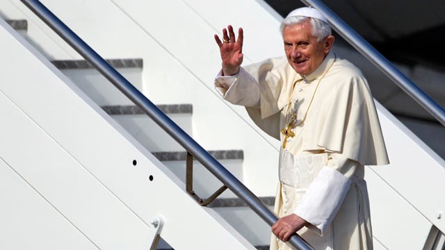 PHOTO: Pope Benedict XVI waves as he boards a plane on his way to a six-day visit to Mexico and Cuba, at Romes Fiumicino international airport on March 23, 2012.