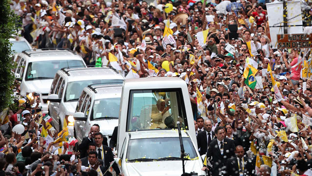 PHOTO: Pope Benedict XVI waves to faithful from his popemobile as he makes his way to Plaza de la Paz or Peace Plaza in Guanajuato, Mexico, Saturday, March 24, 2012.