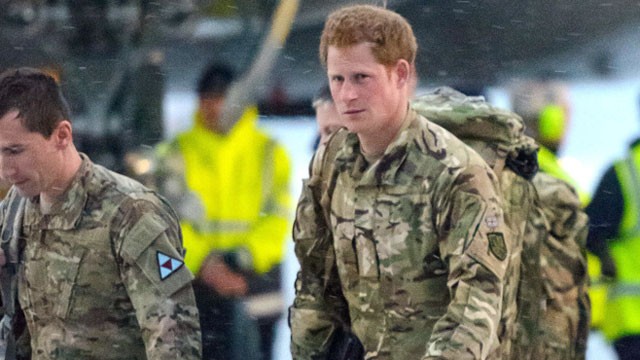 PHOTO: Britain's Prince Harry, right, disembarks from a Voyager transport aircraft following its arrival at RAF Brize Norton, England, Jan. 23, 2013.