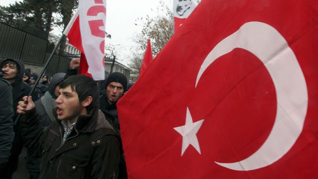 PHOTO: Leftist Turkish students stage a protest outside the French Embassy in Ankara, Turkey on Dec. 24, 2011.