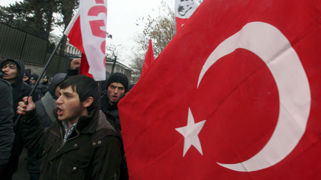 PHOTO: Leftist Turkish students stage a protest outside the French Embassy in Ankara, Turkey on Dec. 24, 2011.