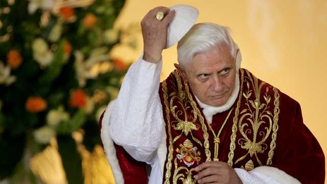 PHOTO: Pope Benedict XVI lifts his scull cap during an ecumenical meeting at the Holy Trinity church in Warsaw, Poland, May 25, 2006.