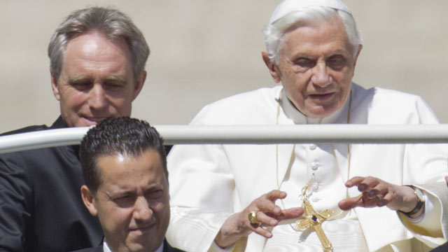 PHOTO: In this photo taken Wednesday, May, 23, 2012, Pope Benedict XVI, flanked by his private secretary Georg Gaenswein, top left, and his butler Paolo Gabiele arrives at St.Peters square at the Vatican for a general audience.