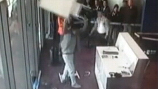 VIDEO: A Communist Party official smashed a gate agents computers after missing his flight.