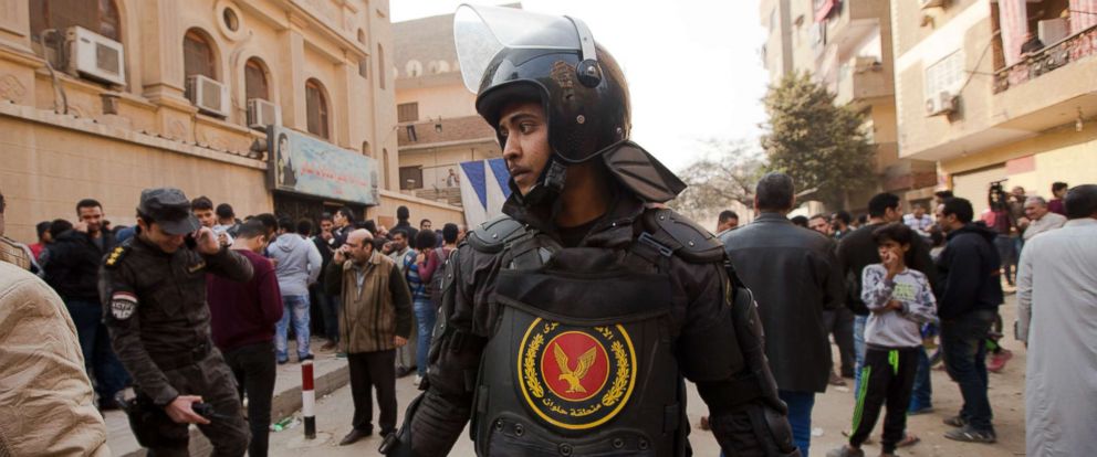 PHOTO: A policeman stands guard in front of Mar Mina church, in Helwan, Cairo, Dec. 29, 2017, where several people have been killed in a shootout outside the church. 