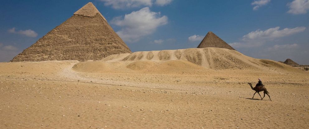 PHOTO: The Pyramid of Khafre with the Great Pyramid and Queens Pyramid in the background .