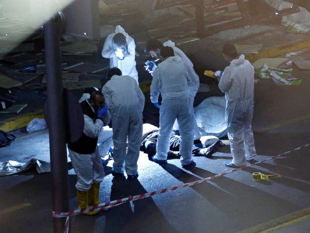 PHOTO: Crime scene investigators work next to a body after an attack at Ataturk Airport in Istanbul, Turkey, June 28, 2016.