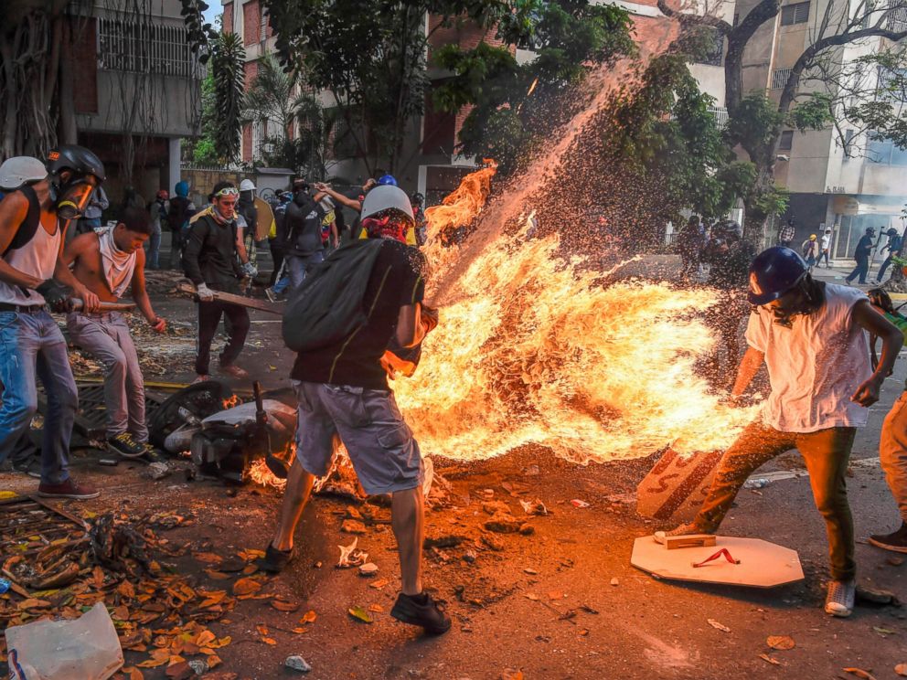 PHOTO: The gas tank of a police motorcycle explodes during clashes in a protest against Venezuelan President Nicolas Maduro, in Caracas on May 3, 2017.