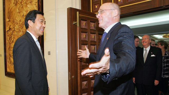 PHOTO: U.S. Treasury Secretary Henry Paulson greets Chinese Commerce Minister Bo Xilai at the Ministry of Commerce in Beijing, China, Sept. 21, 2006.