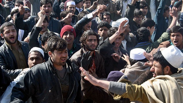 PHOTO: Afghan demonstrators shout anti US-slogans during a protest against Koran desecration in Kunduz, Afghanistan, Feb. 25, 2012.
