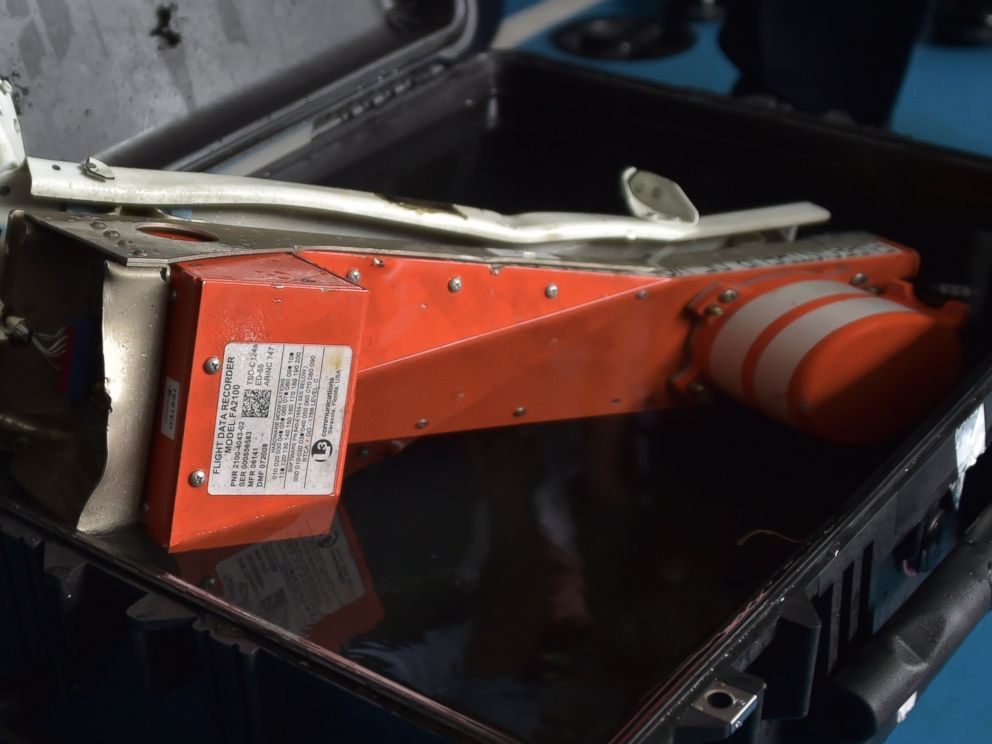 PHOTO: This picture taken onboard Indonesian navy vessel KRI Banda Aceh shows the Flight Data Recorder of the AirAsia flight QZ8501 after it was retrieved from the Java Sea on Jan. 12, 2015.