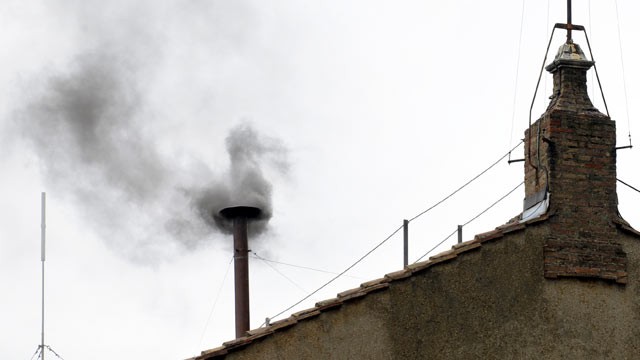 PHOTO: Black smoke rises from the chimney on the roof of the Sistine Chapel meaning that cardinals failed to elect a new pope in the second ballot of their secret conclave, March 13, 2013 at the Vatican.