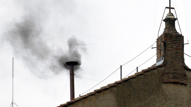 PHOTO: Black smoke rises from the chimney on the roof of the Sistine Chapel meaning that cardinals failed to elect a new pope in the second ballot of their secret conclave, March 13, 2013 at the Vatican.