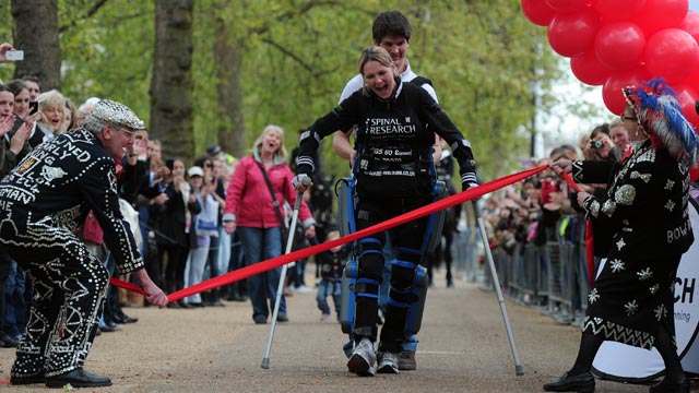 PHOTO: Claire Lomas, who is paralysed and walks with the aid of a "bionic" suit, finishes the London Marathon on May 8, 2012, 16 days after the event began.