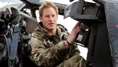 PHOTO: Prince Harry or just plain Captain Wales as he is known in the British Army, makes his early morning pre-flight checks on the flight-line, from Camp Bastion southern Afghanistan, Dec. 12, 2012.