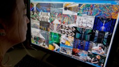 PHOTO: A journalist takes an online tour of the inner workings of Internet search giant Google's data centers October 17, 2012 in Washington.