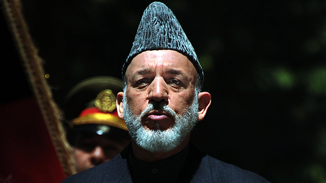 PHOTO: Afghan President Hamid Karzai speaks during a press conference at the presidential palace in Kabul on May 3, 2012.