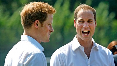 PHOTO: Prince William, Duke of Cambridge, and Prince Harry visit Bacon's College on July 26, 2012 in London, England.