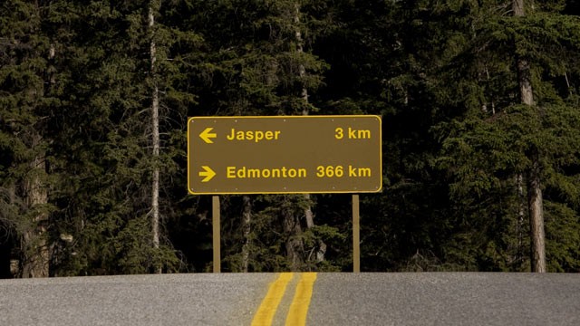 PHOTO: A sign for Highway 16 points to Edmonton and Jasper in the Alberta province of Canada.