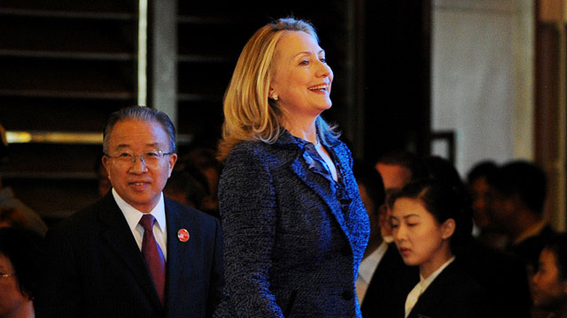 PHOTO: US Secretary of State Hillary Clinton (C) and China's State Councillor Dai Bingguo (L) arrive for the opening ceremony of the US-China Strategic and Economic Dialogue at the Diaoyutai Guesthouse in Beijing on May 3, 2012.