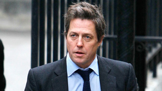 PHOTO: British actor Hugh Grant arrives to give evidence at the the Leveson ... PHOTO: British actor Hugh Grant arrives to give evidence at the the Leveson ...