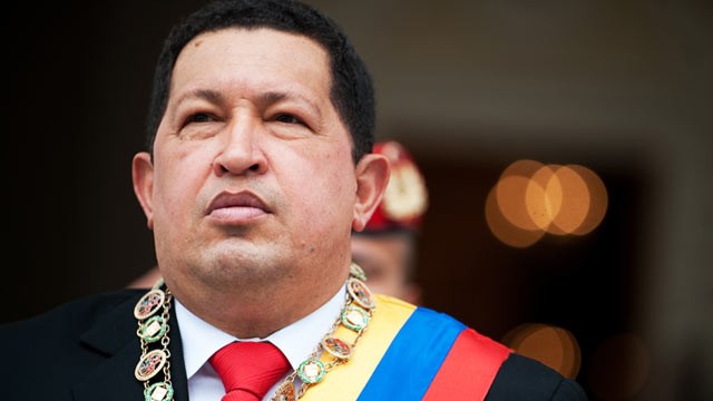 PHOTO: Venezuelan President Hugo Chavez, listens to the national anthem as he arrives at the Congress building in Caracas, Jan. 15, 2011 to present the 2010 annual report to the National Assembly.