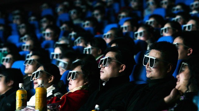 PHOTO: Audience members watch a movie through 3D glasses at a newly opened IMAX theatre on February 8, 2007 in Wuhan of Hubei Province, China in this file photo.
