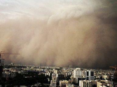 Photos: Massive Sandstorm Swallows Entire City