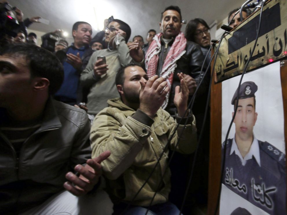 PHOTO: A man prays for Jordanian pilot Muath al-Kasasbeh after hearing the news of his execution at the Kasasbeh tribe society on Feb. 3, 2015 in Amman, Jordan.