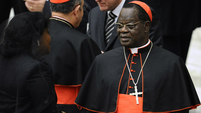 PHOTO: Laurent Monsengwo Pasinya speaks with a relative, November 2010, at the Paul VI hall at The Vatican.