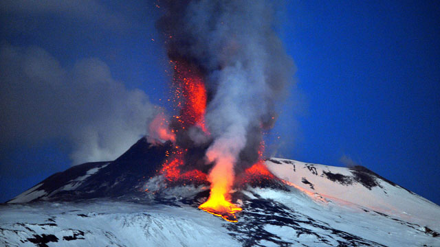 PHOTO: Lava spews from a crater of the giant Etna Volcano on the southern Italian island of Sicily, Jan. 6, 2012.