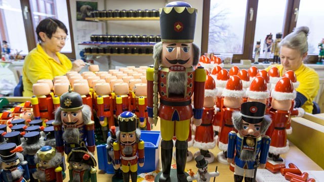 PHOTO: The Artisans, Martina Beyer, left, and Christina Reimer, at the Seiffener Volkskunst Christmas decorations manufactory assemble nutcrackers on Nov. 20, 2012 in Seiffen, Germany.