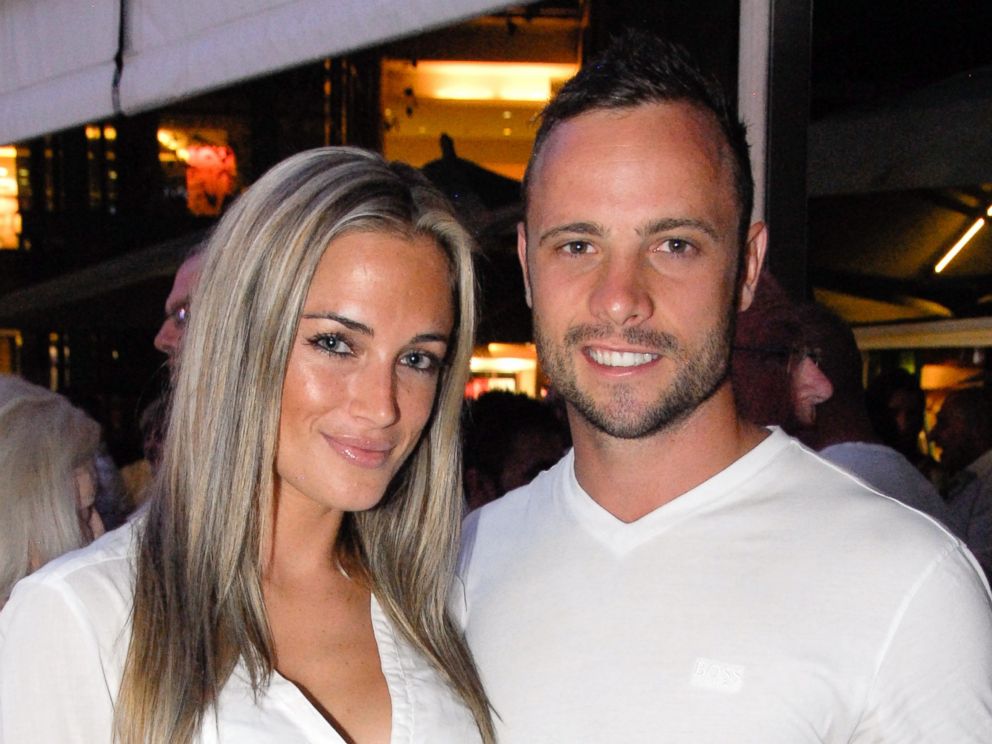 PHOTO: A picture taken on Jan. 26, 2013 shows Olympian sprinter Oscar Pistorius posing next to his girlfriend Reeva Steenkamp at Melrose Arch in Johannesburg.