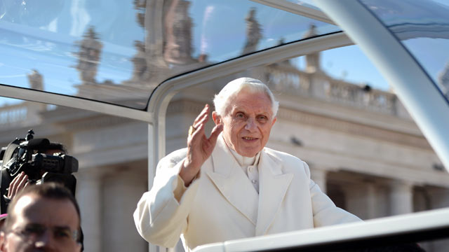 PHOTO: Pope Benedict XVI waves as he arrives on St Peter's square for his last weekly audience, Feb. 27, 2013 at the Vatican.