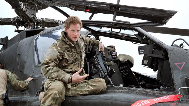 PHOTO: In this image released on January 21, 2013, Prince Harry, makes early morning checks as he sits on an Apache helicopter at the British controlled flight-line at Camp Bastion on December 12, 2012 in Afghanistan.