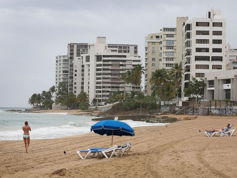PHOTO: A woman walks on the beach on July 1, 2015 in San Juan, Puerto Rico.