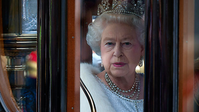 PHOTO: Queen Elizabeth II arrives in the Australian State Coach at the Palace of Westminster during the State Opening of Parliament in London, England.