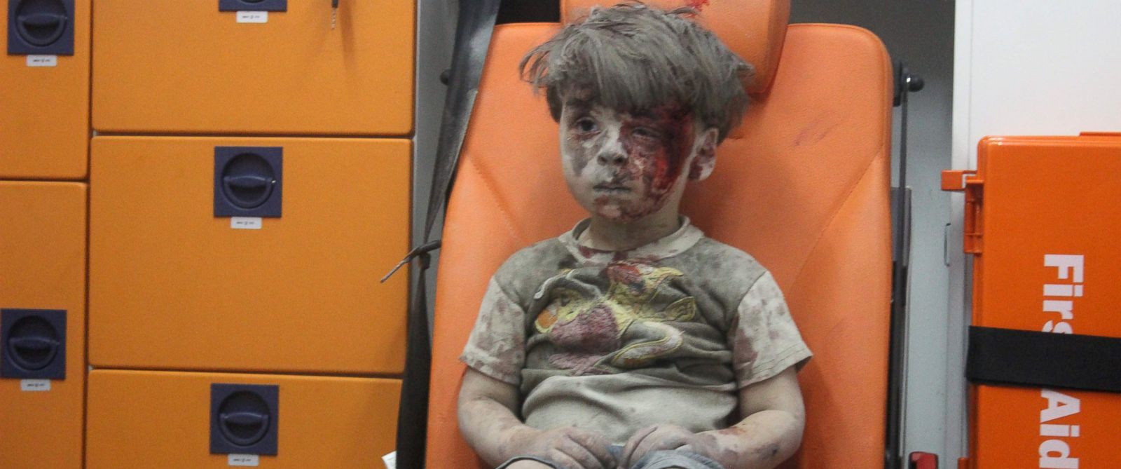 PHOTO: Omran Daqneesh, 4, sits in an ambulance after being rescued from the rubble of a building hit by an air strike in the rebel-held Qaterji neighborhood of the northern Syrian city of Aleppo late on Aug. 17, 2016.