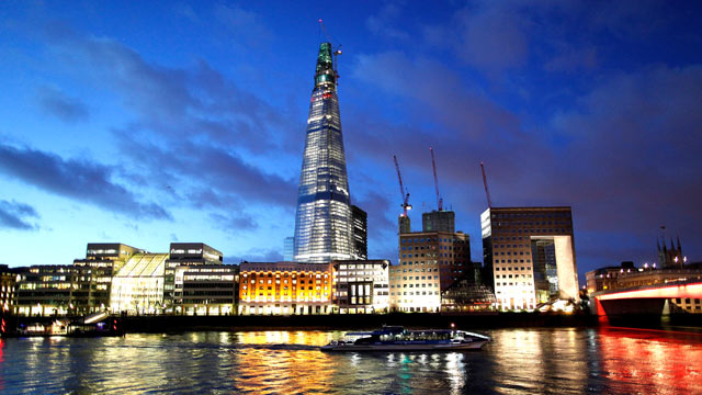 PHOTO: A boat moves along the River Thames against the backdrop of the Shard tower in London, Dec. 13, 2011.