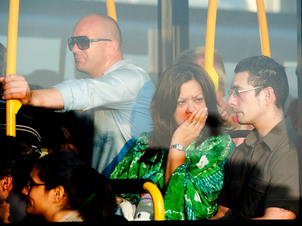 PHOTO: Family members of passengers killed in the crash of Air Malaysia flight MH17 leave Schiphol airport in a bus on July 17, 2014 in Amsterdam, Netherlands.