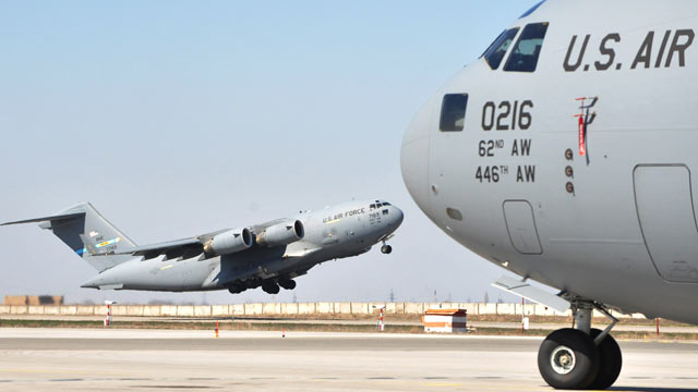 PHOTO: A US military cargo plane takes off at the US transit center Manas, near Bishkek, Kyrgyzstan, March 27, 2012.