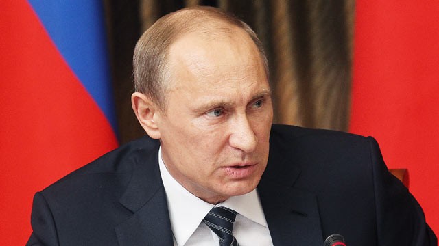 PHOTO: Russian President Vladimir Putin speaks during a meeting with minsters and officials in Elista, April 16, 2013 in the Kalmykia region of Russia.
