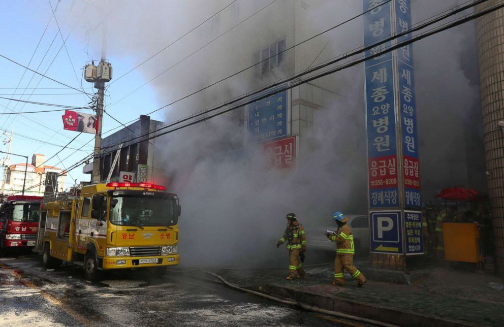 PHOTO: Firefighters try to put out a fire at a hospital building in Miryang, South Korea, Jan. 26, 2018.