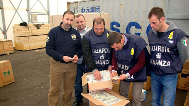 PHOTO: Italian police look at counterfeit train tickets