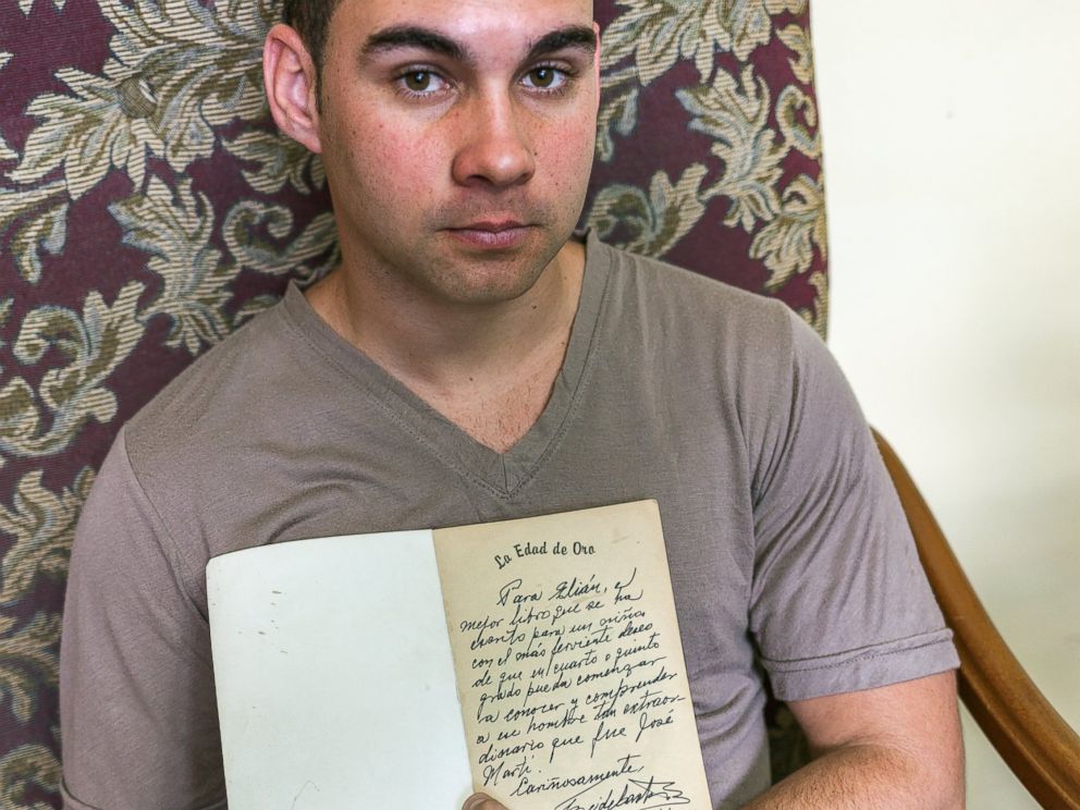 PHOTO: Elian Gonzalez holds a copy of La Edad de Oro by Jose Marti, - ht_elian_gonzalez_1_kb_150423_4x3_992