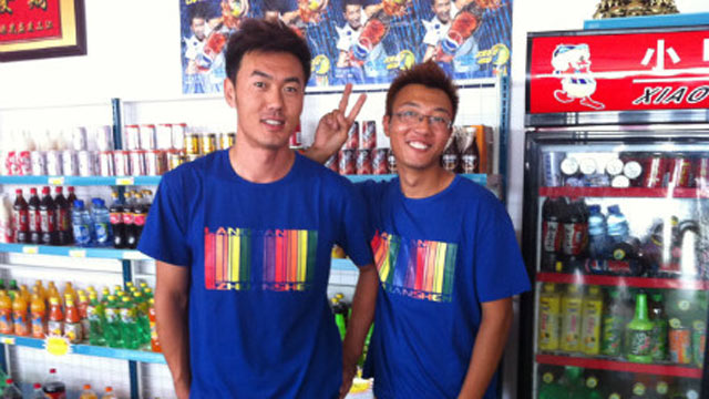 PHOTO: A gay couple from Hebei province poses for their wedding photos.